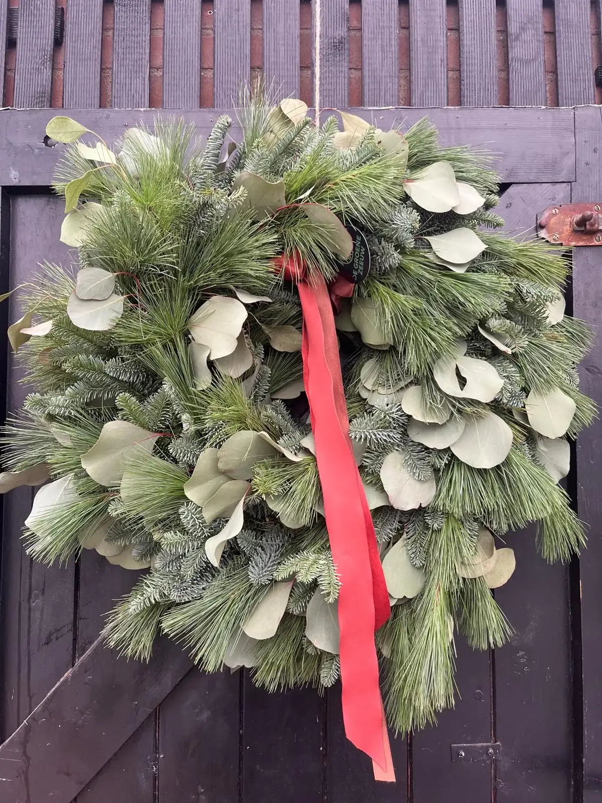 Bloemkrans, pastel en zacht, met droogbloemen, handgemaakt door De Groene Zeeuw